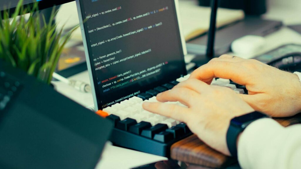 Person coding a business web app